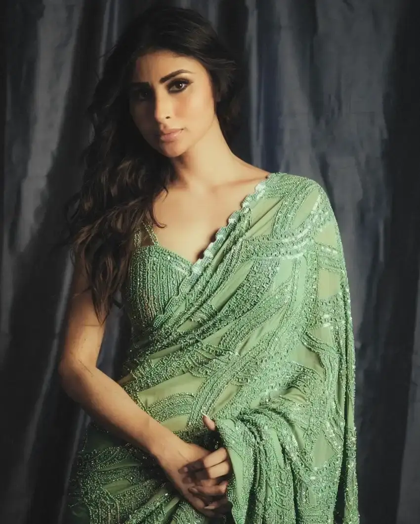 NORTH INDIAN TV ACTRESS MOUNI ROY IN SLEEVELESS GREEN SAREE